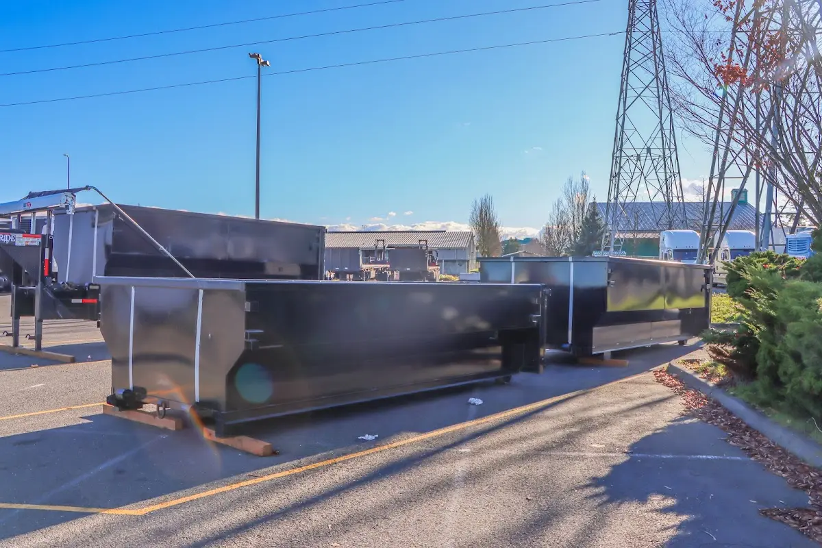Roll-off dumpster ready for waste disposal at job site for Concrete Dumpster Rental in Canyon Lake